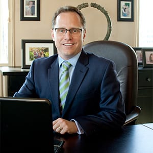 Dr. Strawn at his desk